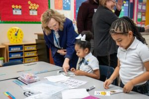 TEA representatives observe students in Cityscape Schools dual language classrooms, highlighting bilingual learning and innovative technology.
